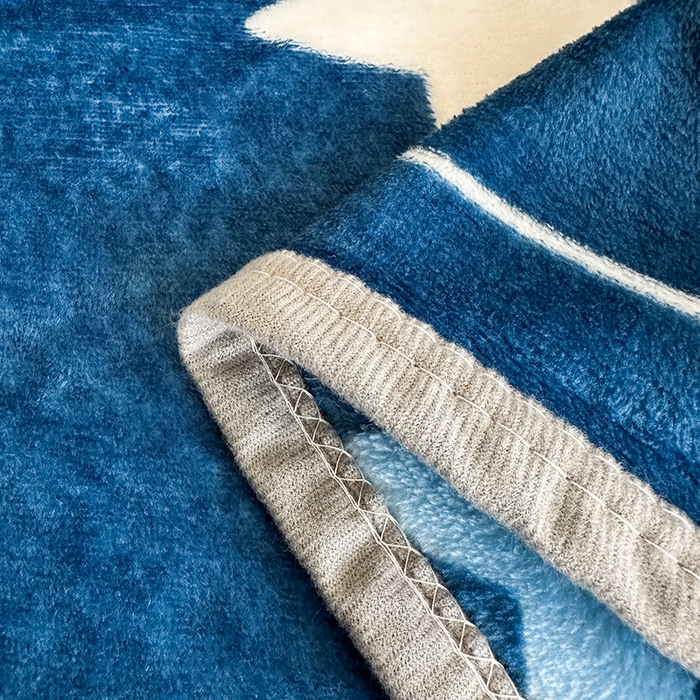 91家纺网 家纺一手货源 找家纺 欧喜璐 2025新款卡通印花加厚牛奶绒多功能毛毯 太空熊