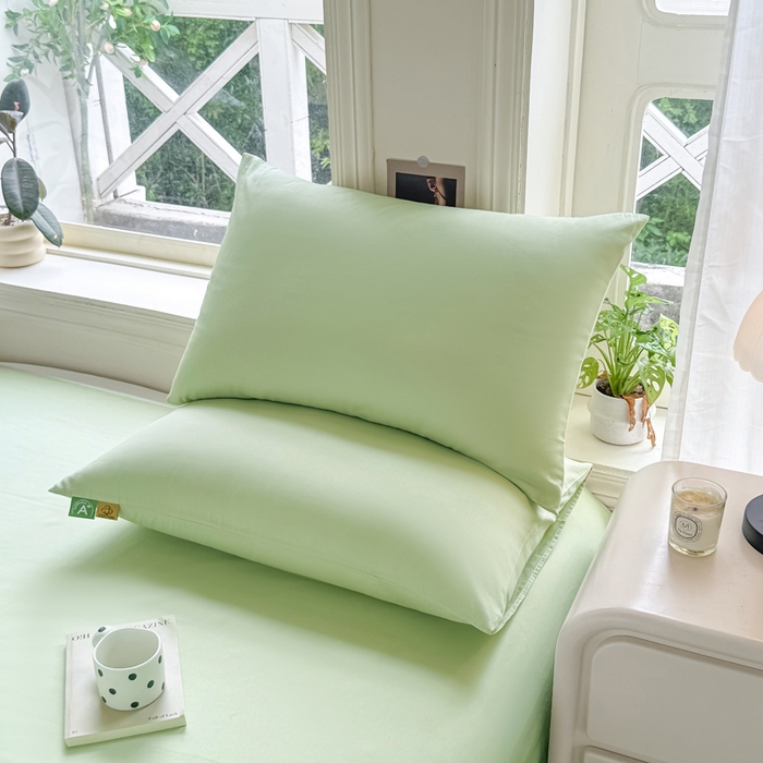 91家纺网 家纺一手货源 找家纺 凡客家居 2025新款全棉纯色简约枕套系列 嫩芽绿