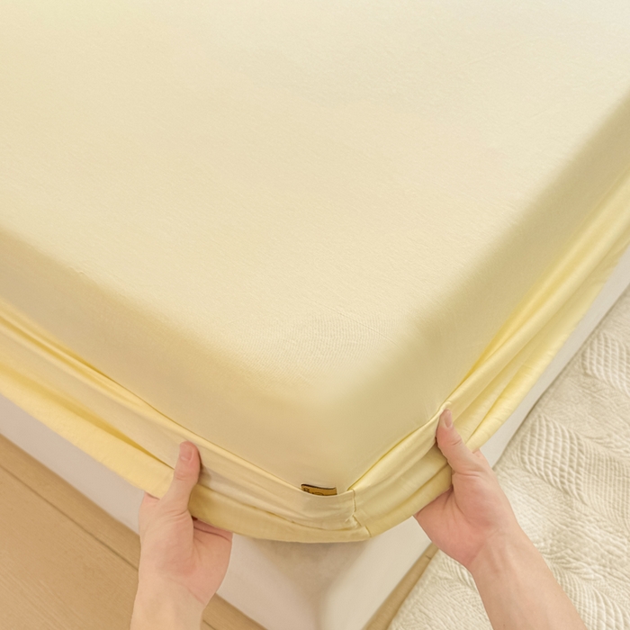 91家纺网 家纺一手货源 找家纺 凡客家居 2025新款全棉纯色简约床笠系列 茉莉黄