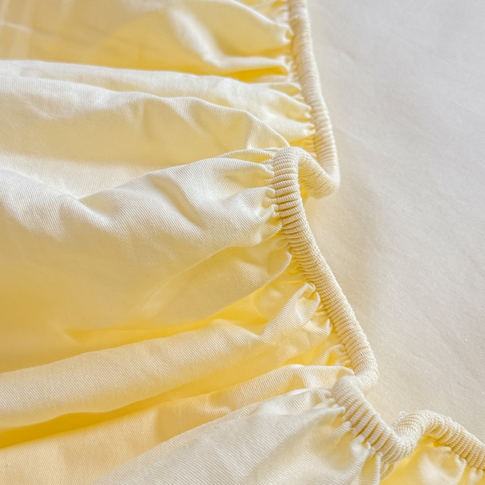 91家纺网 家纺一手货源 找家纺 凡客家居 2025新款全棉纯色简约床笠系列 茉莉黄