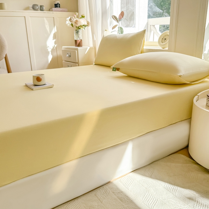91家纺网 家纺一手货源 找家纺 凡客家居 2025新款全棉纯色简约床笠系列 茉莉黄
