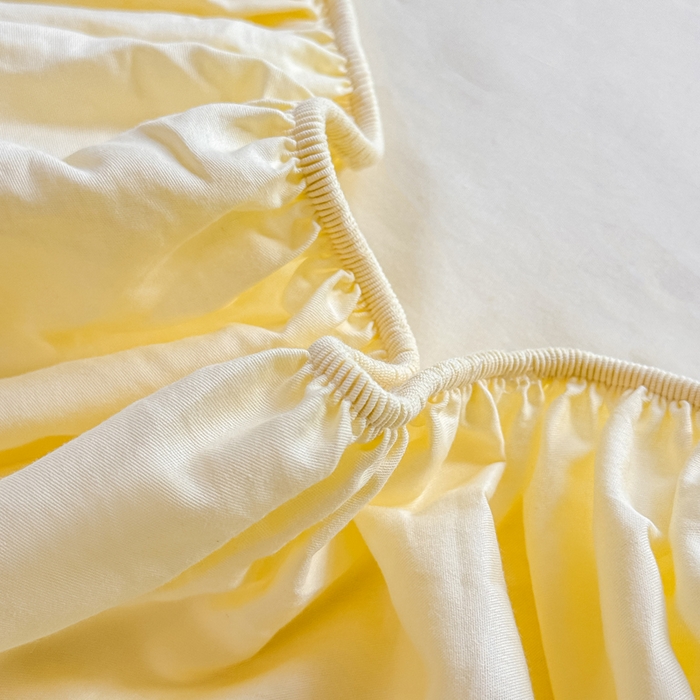 91家纺网 家纺一手货源 找家纺 凡客家居 2025新款全棉纯色简约床笠系列 茉莉黄