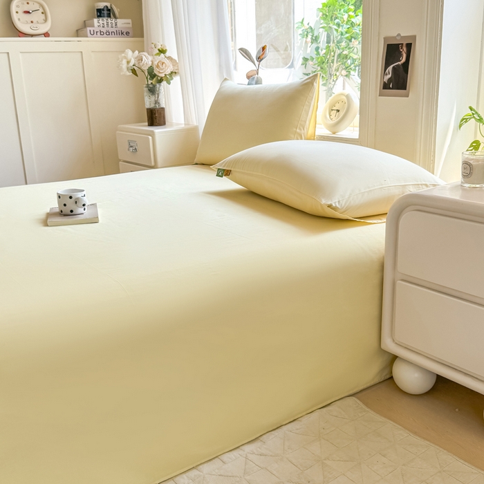 91家纺网 家纺一手货源 找家纺 凡客家居 2025新款全棉纯色简约单品床单系列 茉莉黄