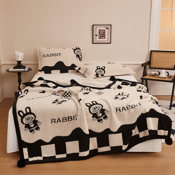 91家纺网 家纺一手货源 找家纺 肖恩毯业 2025新款黑白阳离子熊猫绒多功能毛毯 熊猫绒-小布布球