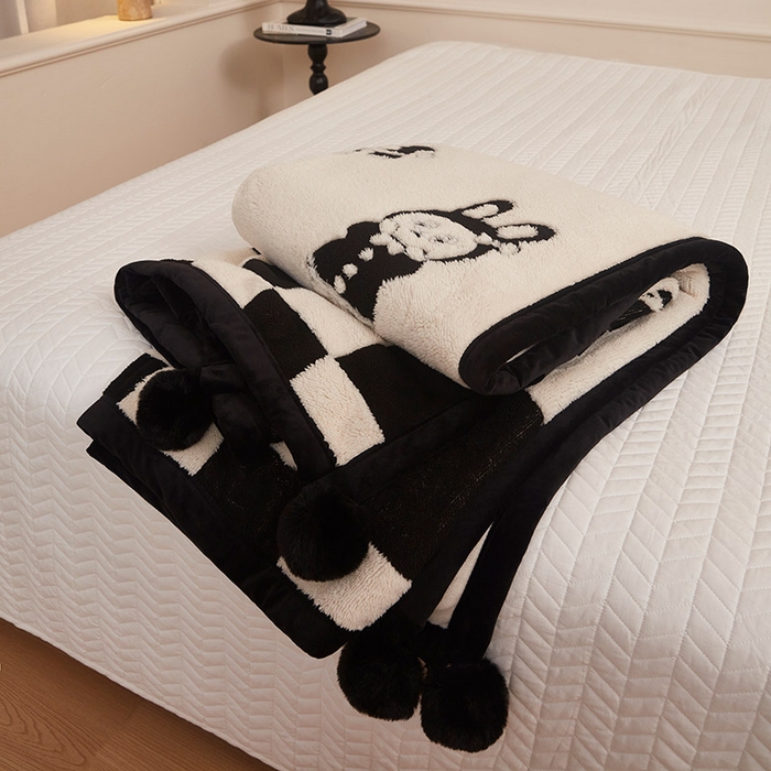 91家纺网 家纺一手货源 找家纺 肖恩毯业 2025新款黑白阳离子熊猫绒多功能毛毯 熊猫绒-小布布球