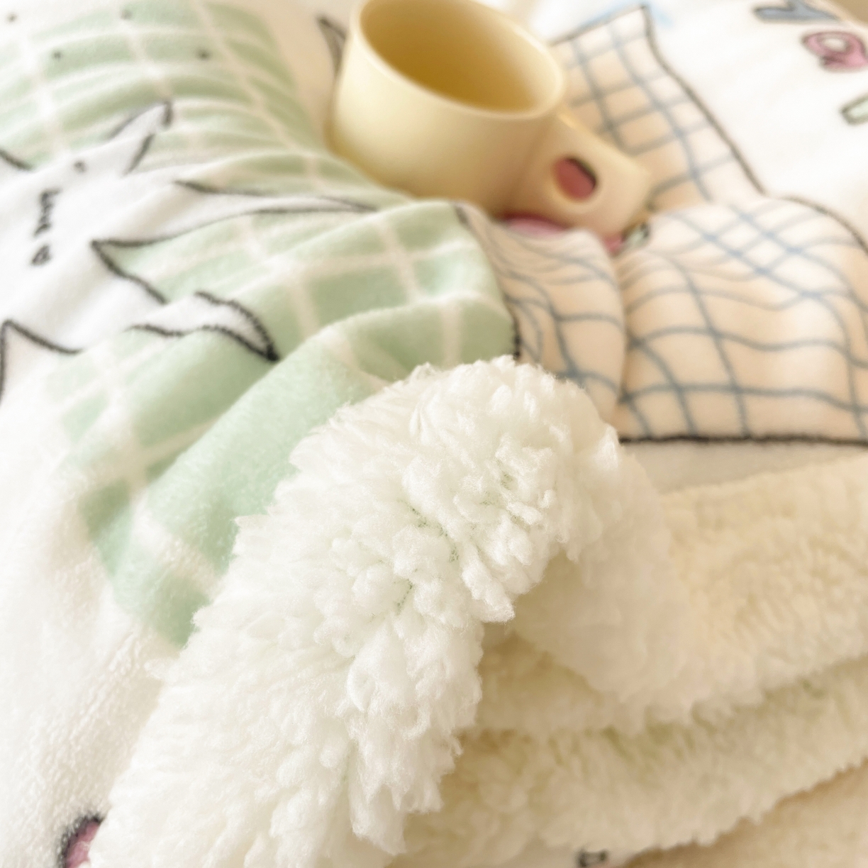 91家纺网 家纺一手货源 找家纺 十里居 2025新款印花牛奶绒羊羔绒盖毯毛毯午休毯卡通多功能沙发毯 卡哇伊