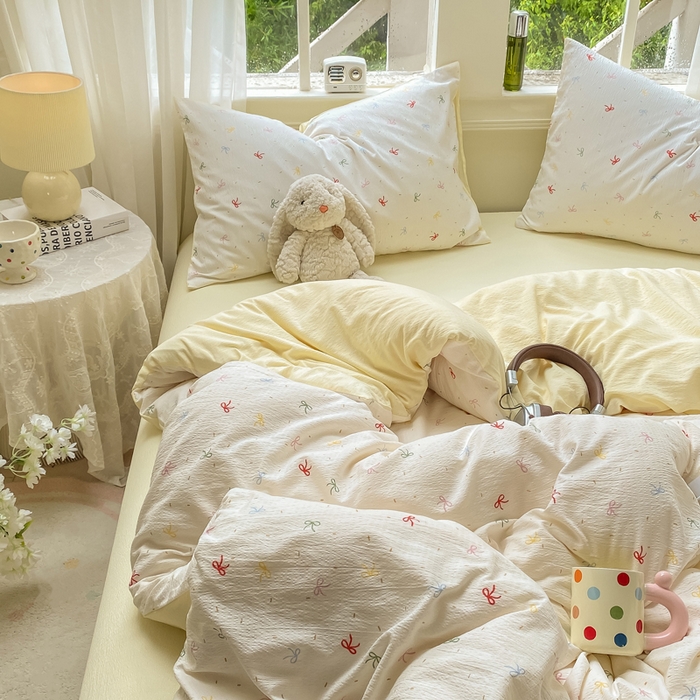 91家纺网 家纺一手货源 找家纺 朵朵家纺 2025新款云感提花双层纱印花四件套 奶油蝴蝶结