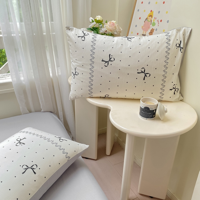 91家纺网 家纺一手货源 找家纺 朵朵家纺 2025新款云感提花双层纱印花单品枕套 法式蝴蝶结