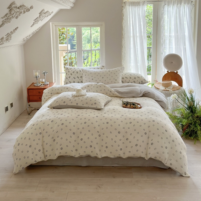 91家纺网 家纺一手货源 找家纺 木楌家居 2025春夏新品全棉A类皱皱纱印花四件套 微笑