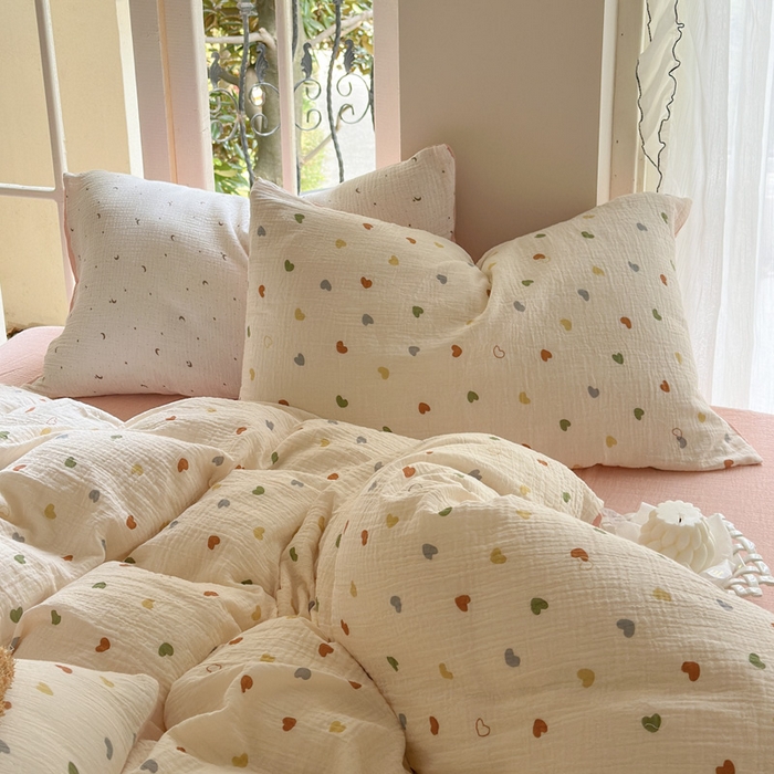 91家纺网 家纺一手货源 找家纺 木楌家居 2025春夏新品全棉A类皱皱纱印花四件套 奶油爱心