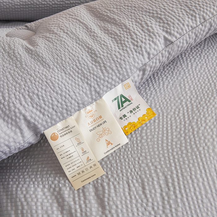 91家纺网 家纺一手货源 找家纺 欢乐季2025新款7A抗菌A类提花皱皱纱大豆纤维被四季被+被芯 高级灰