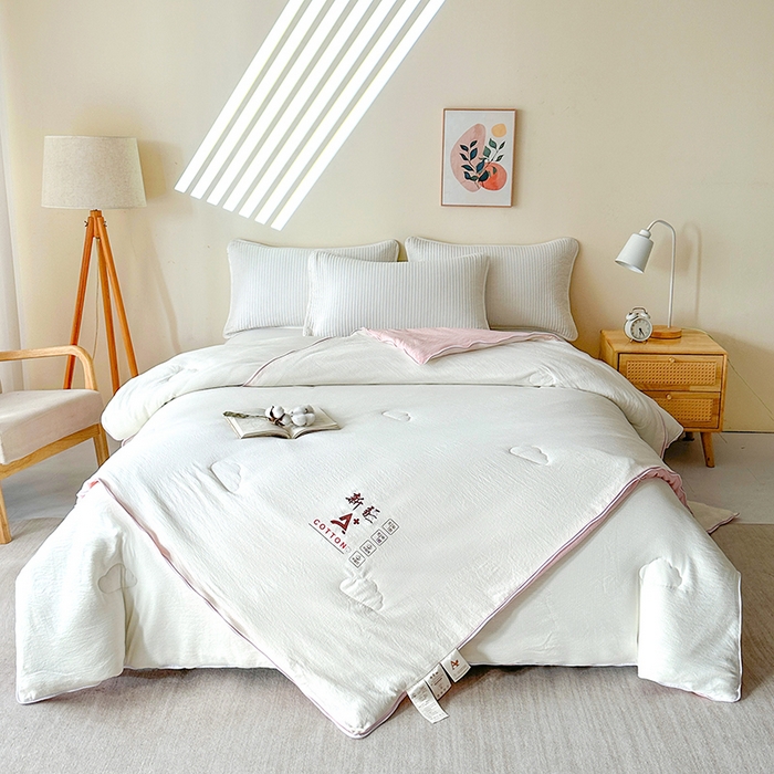 91家纺网 家纺一手货源 找家纺 鸣创 2025新款新疆棉花被双拼被子冬被被芯二合一棉花子母被木棉春秋被 白拼粉