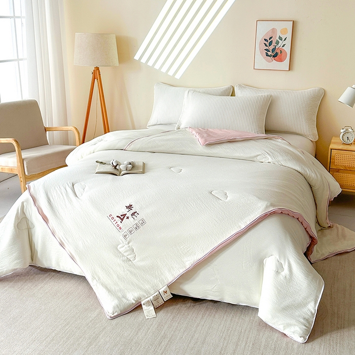 91家纺网 家纺一手货源 找家纺 鸣创 2025新款新疆棉花被双拼被子冬被被芯二合一棉花子母被木棉春秋被 白拼粉