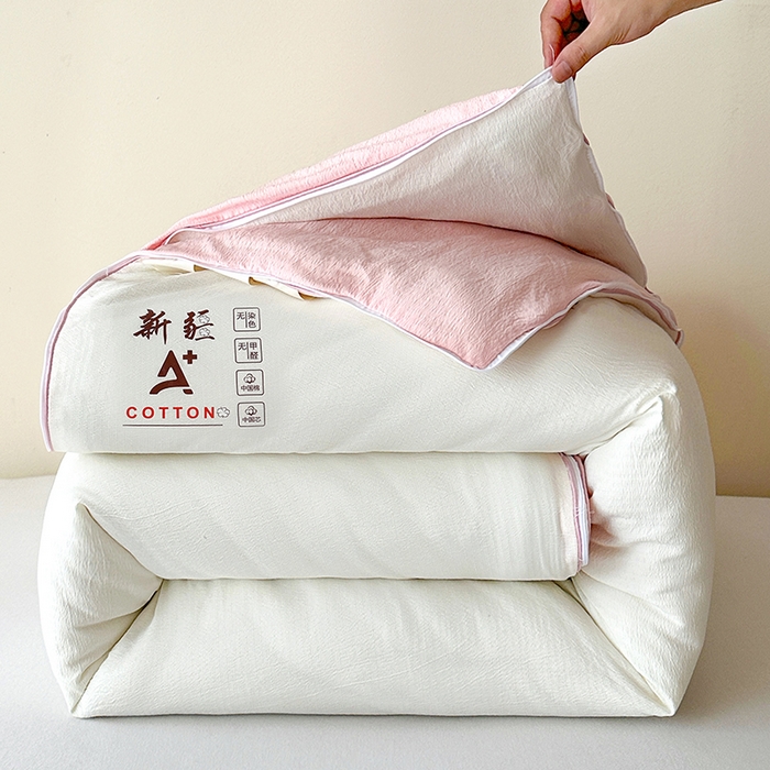 91家纺网 家纺一手货源 找家纺 鸣创 2025新款新疆棉花被双拼被子冬被被芯二合一棉花子母被木棉春秋被 白拼粉