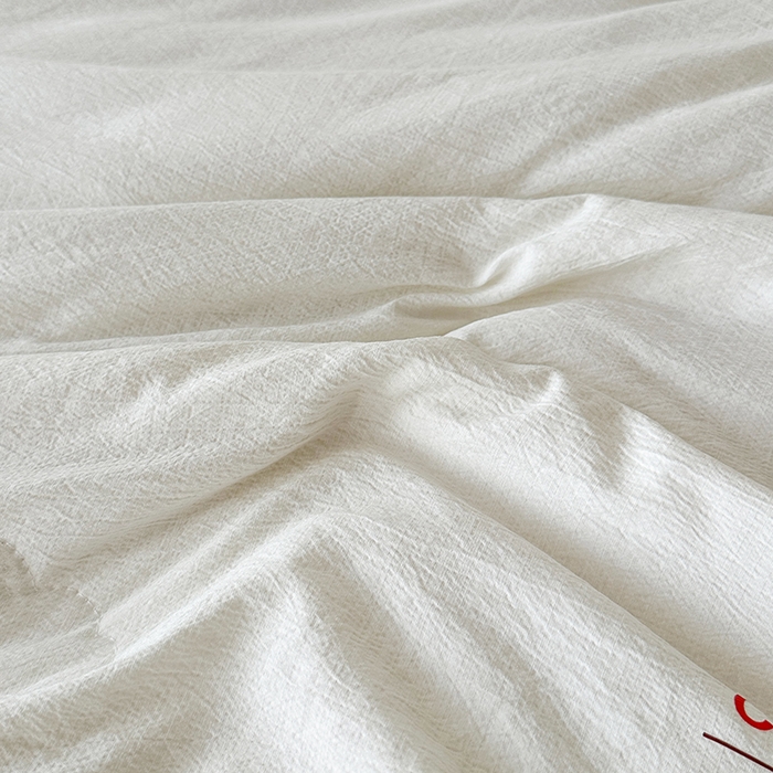 91家纺网 家纺一手货源 找家纺 鸣创 2025新款新疆棉花被双拼被子冬被被芯二合一棉花子母被木棉春秋被 珍珠白