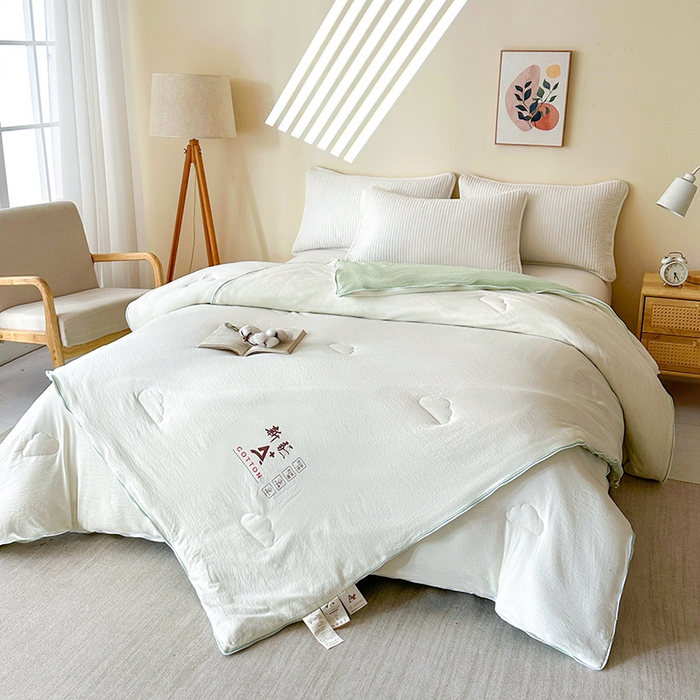 91家纺网 家纺一手货源 找家纺 鸣创 2025新款新疆棉花被双拼被子冬被被芯二合一棉花子母被木棉春秋被 白拼绿