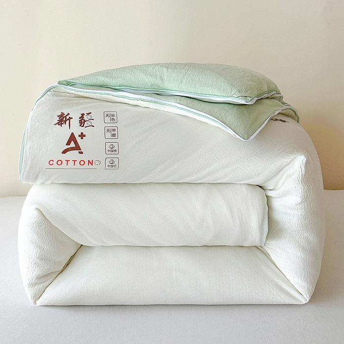 91家纺网 家纺一手货源 找家纺 鸣创 2025新款新疆棉花被双拼被子冬被被芯二合一棉花子母被木棉春秋被 白拼绿