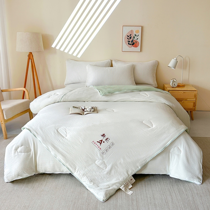 91家纺网 家纺一手货源 找家纺 鸣创 2025新款新疆棉花被双拼被子冬被被芯二合一棉花子母被木棉春秋被 白拼绿