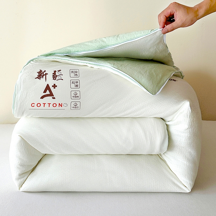 91家纺网 家纺一手货源 找家纺 鸣创 2025新款新疆棉花被双拼被子冬被被芯二合一棉花子母被木棉春秋被 白拼绿