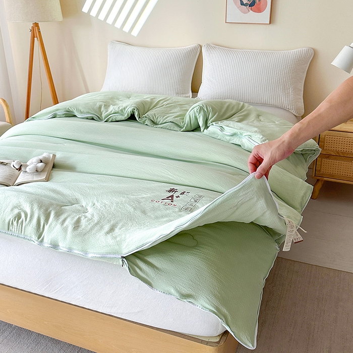 91家纺网 家纺一手货源 找家纺 鸣创 2025新款新疆棉花被双拼被子冬被被芯二合一棉花子母被木棉春秋被 青雅绿