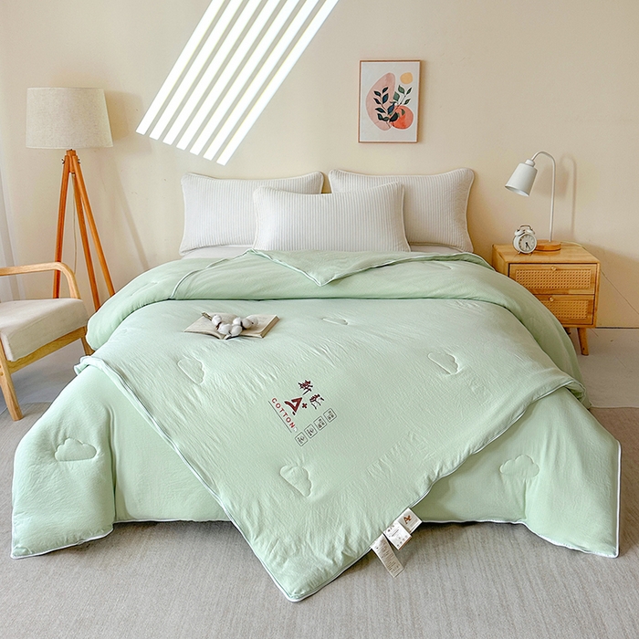 91家纺网 家纺一手货源 找家纺 鸣创 2025新款新疆棉花被双拼被子冬被被芯二合一棉花子母被木棉春秋被 青雅绿
