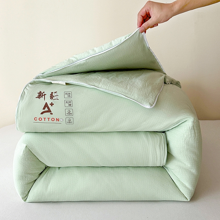 91家纺网 家纺一手货源 找家纺 鸣创 2025新款新疆棉花被双拼被子冬被被芯二合一棉花子母被木棉春秋被 青雅绿