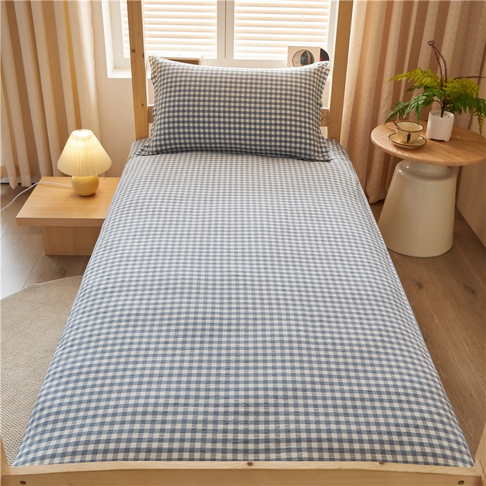 91家纺网 家纺一手货源 找家纺 悠米悠家 2025新款新疆棉花学生款可拆洗床垫 蓝小格