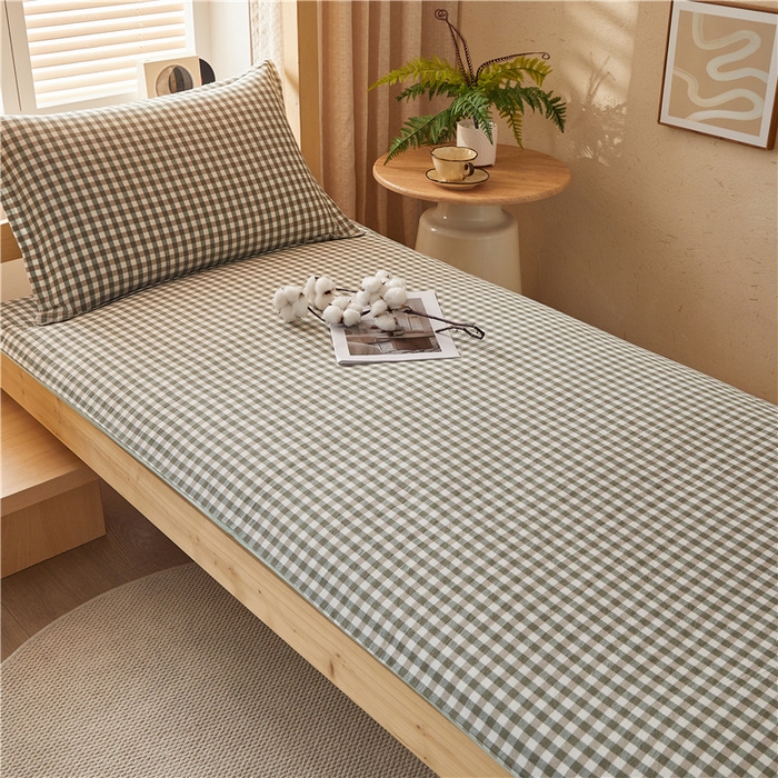 91家纺网 家纺一手货源 找家纺 悠米悠家 2025新款新疆棉花学生款可拆洗床垫 绿小格