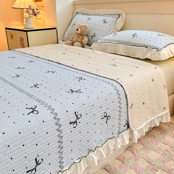 91家纺网 家纺一手货源 找家纺 岚吉家纺 2025新款有氧双层纱花边床盖系列爱心蝴蝶结-蓝