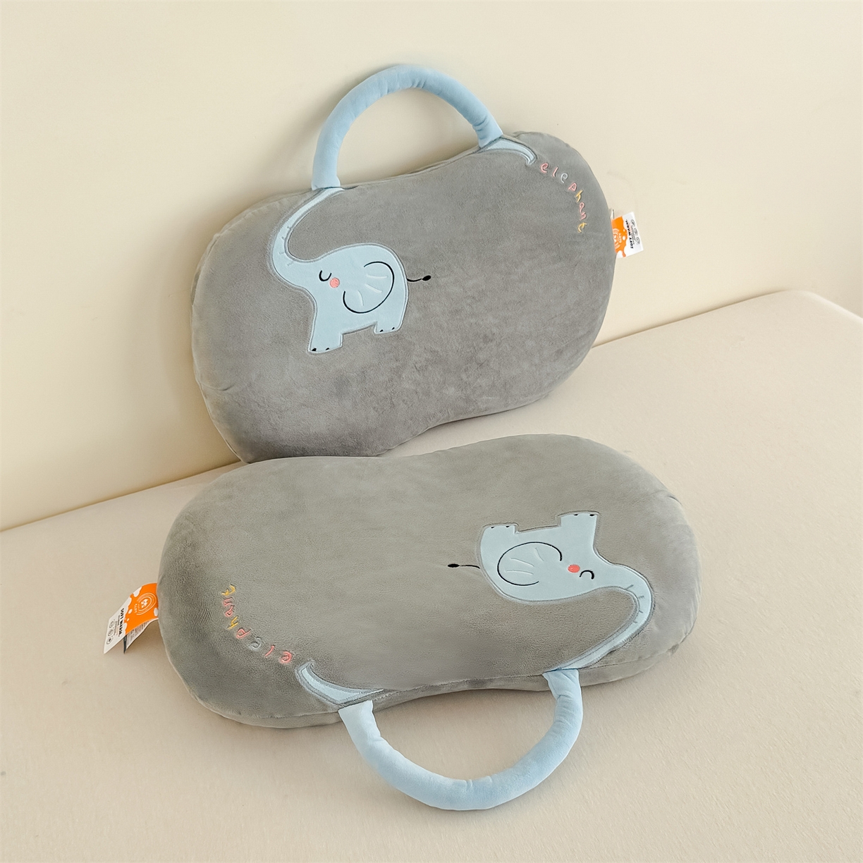 91家纺网 家纺一手货源 找家纺 麦肯锡 2025新款暖绒大象手提猫肚枕枕头枕芯单枕芯 灰色