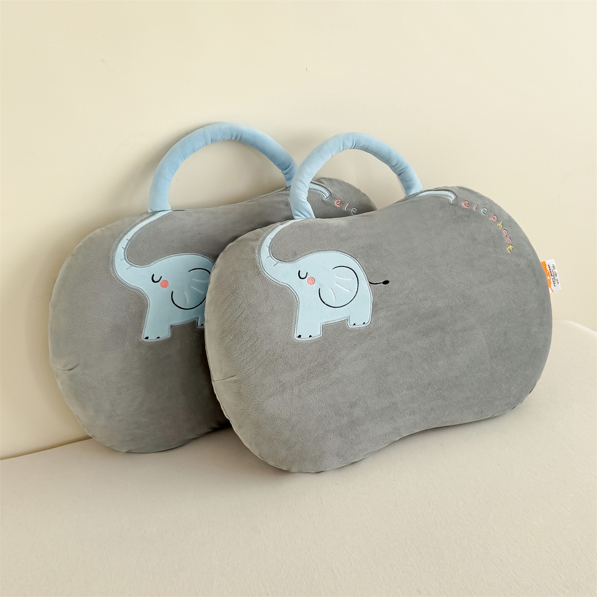 91家纺网 家纺一手货源 找家纺 麦肯锡 2025新款暖绒大象手提猫肚枕枕头枕芯单枕芯 灰色