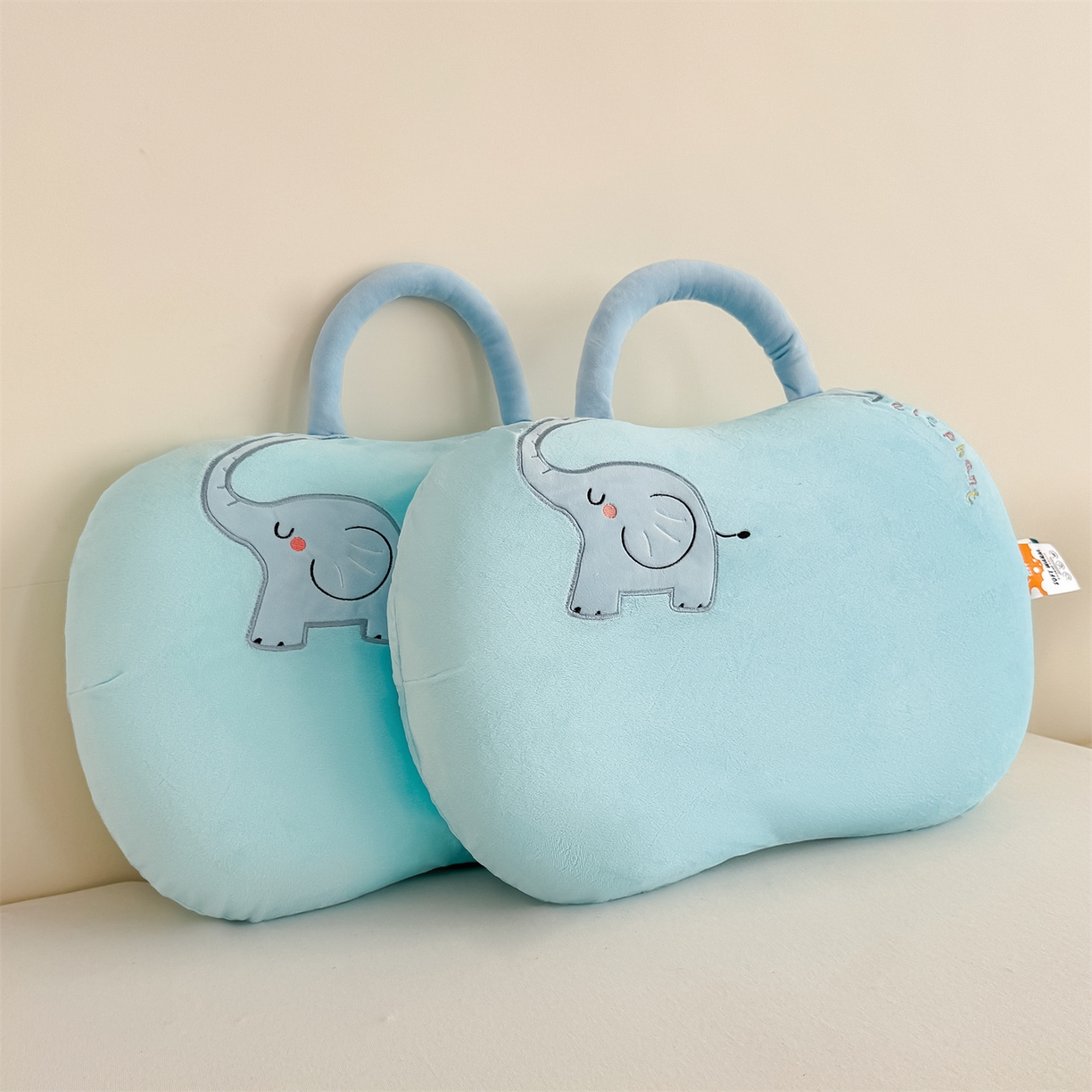 91家纺网 家纺一手货源 找家纺 麦肯锡 2025新款暖绒大象手提猫肚枕枕头枕芯单枕芯 蓝色