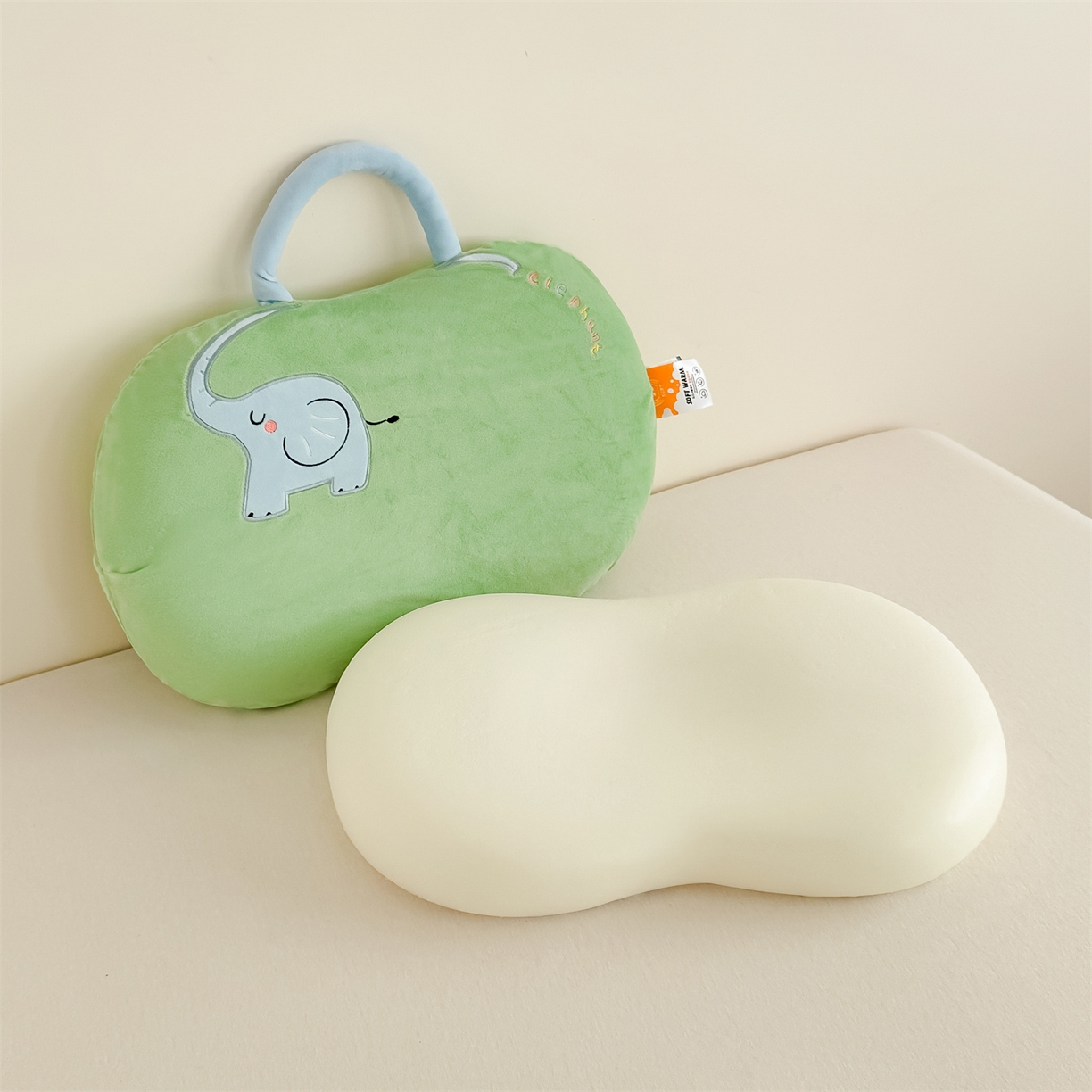 91家纺网 家纺一手货源 找家纺 麦肯锡 2025新款暖绒大象手提猫肚枕枕头枕芯单枕芯 绿色