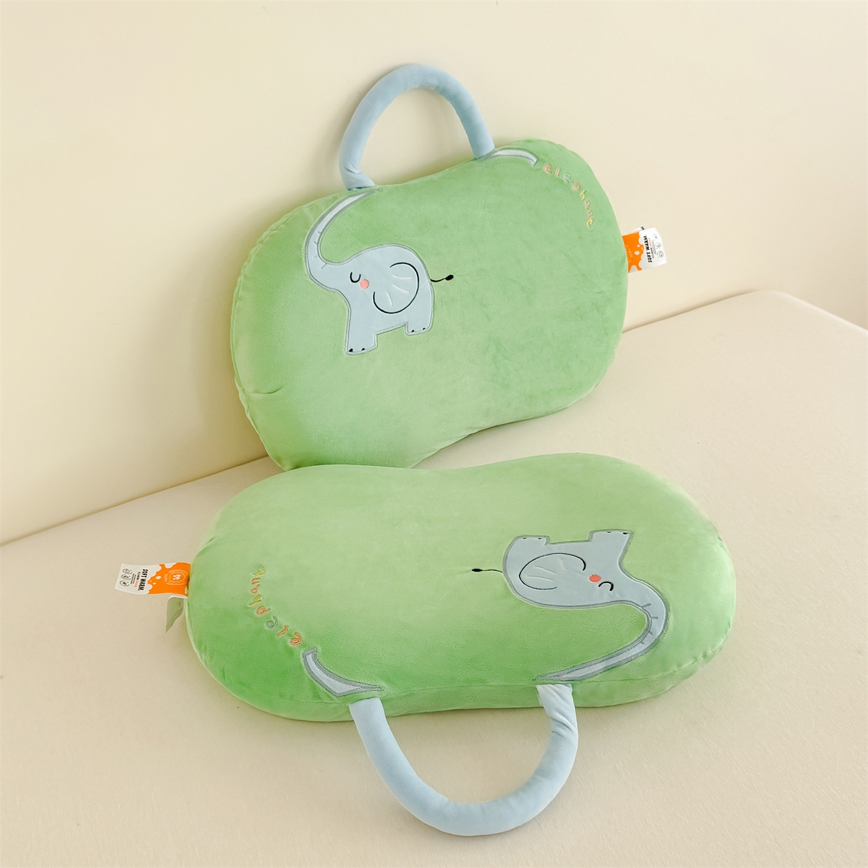 91家纺网 家纺一手货源 找家纺 麦肯锡 2025新款暖绒大象手提猫肚枕枕头枕芯单枕芯 绿色