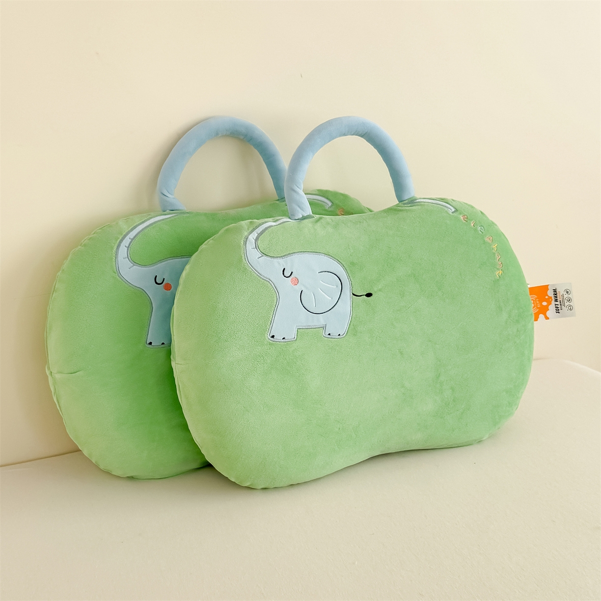 91家纺网 家纺一手货源 找家纺 麦肯锡 2025新款暖绒大象手提猫肚枕枕头枕芯单枕芯 绿色