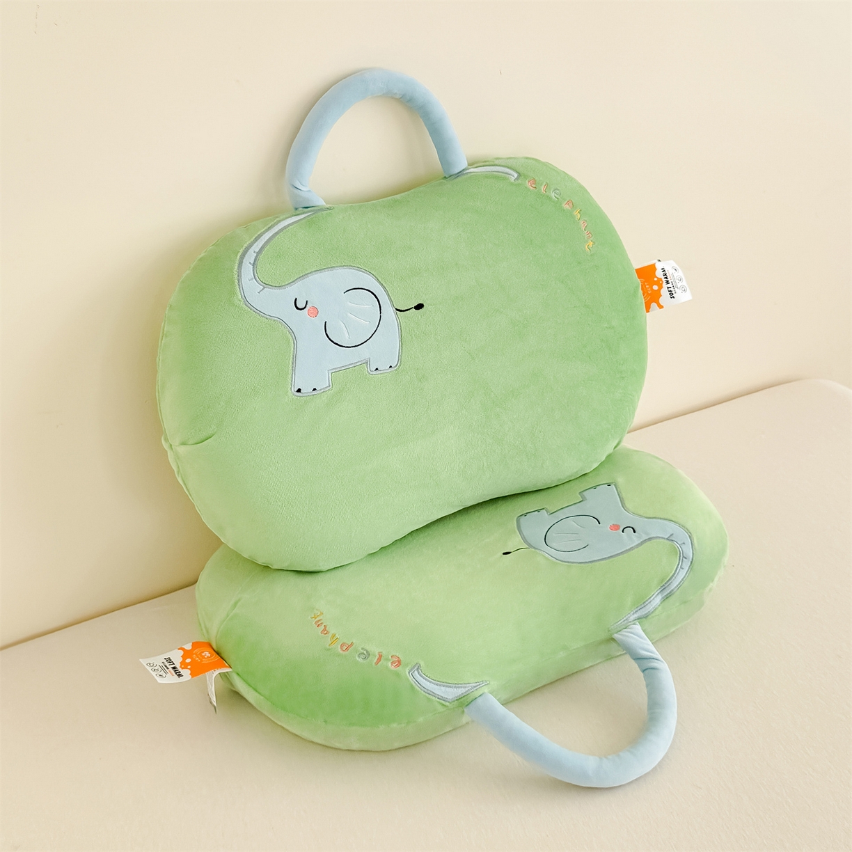 91家纺网 家纺一手货源 找家纺 麦肯锡 2025新款暖绒大象手提猫肚枕枕头枕芯单枕芯 绿色