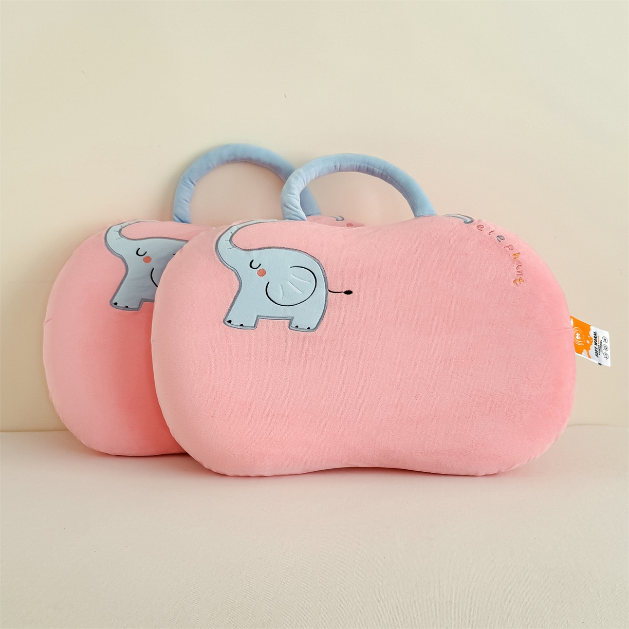 91家纺网 家纺一手货源 找家纺 麦肯锡 2025新款暖绒大象手提猫肚枕枕头枕芯单枕芯 粉色