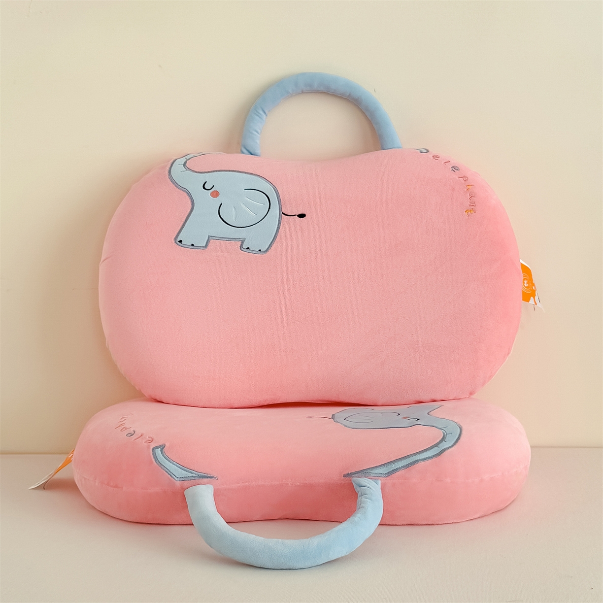 91家纺网 家纺一手货源 找家纺 麦肯锡 2025新款暖绒大象手提猫肚枕枕头枕芯单枕芯 粉色