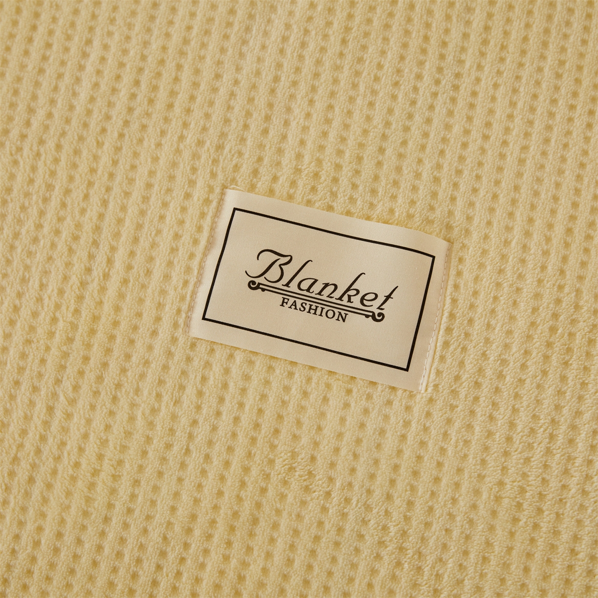 91家纺网 家纺一手货源 找家纺 雯豆家纺 2025新品华夫格毛毯盖毯双层加厚办公室披肩毯子 自由风-可可蛋黄