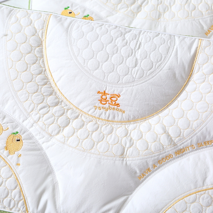 91家纺网 家纺一手货源 找家纺 糖果枕芯 2025新款儿童枕芯分区护颈学生枕头全棉枕芯 喜豆绿色边