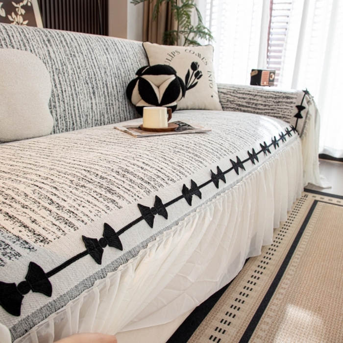 91家纺网 家纺一手货源 找家纺 沐沐家纺 2026新款宛柔蝴蝶结裙边沙发巾 黑色