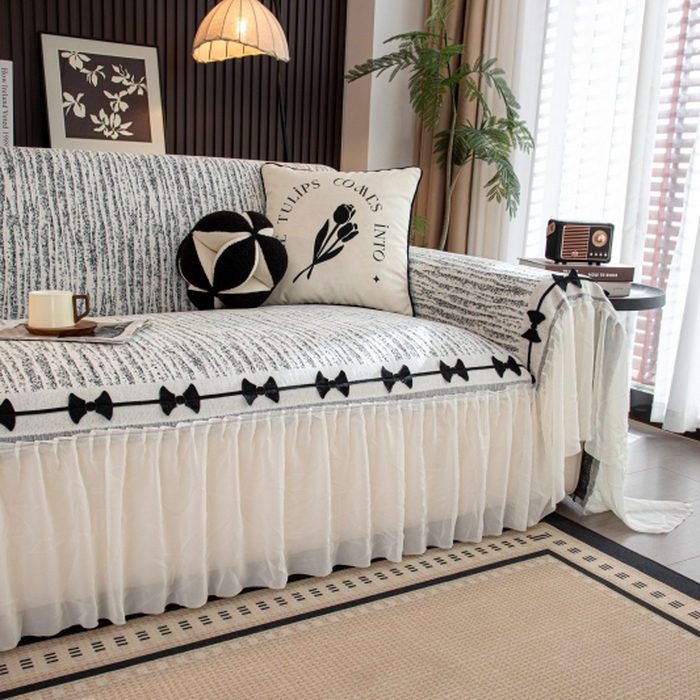 91家纺网 家纺一手货源 找家纺 沐沐家纺 2026新款宛柔蝴蝶结裙边沙发巾 黑色