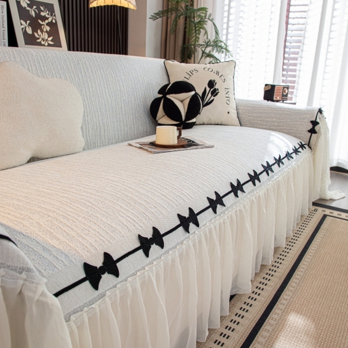 91家纺网 家纺一手货源 找家纺 沐沐家纺 2026新款宛柔蝴蝶结裙边沙发巾 灰色