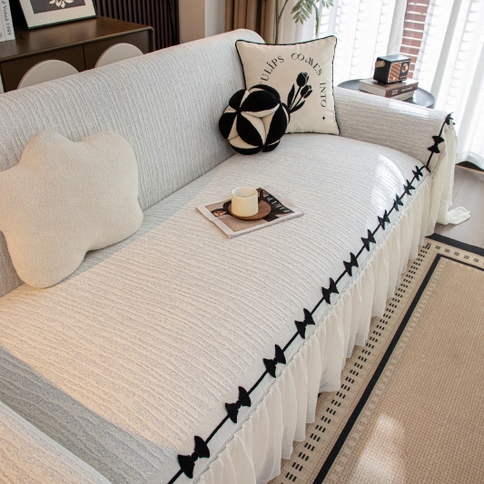 91家纺网 家纺一手货源 找家纺 沐沐家纺 2026新款宛柔蝴蝶结裙边沙发巾 灰色