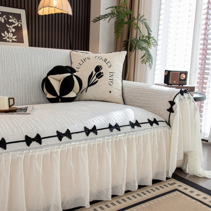 91家纺网 家纺一手货源 找家纺 沐沐家纺 2026新款宛柔蝴蝶结裙边沙发巾 灰色