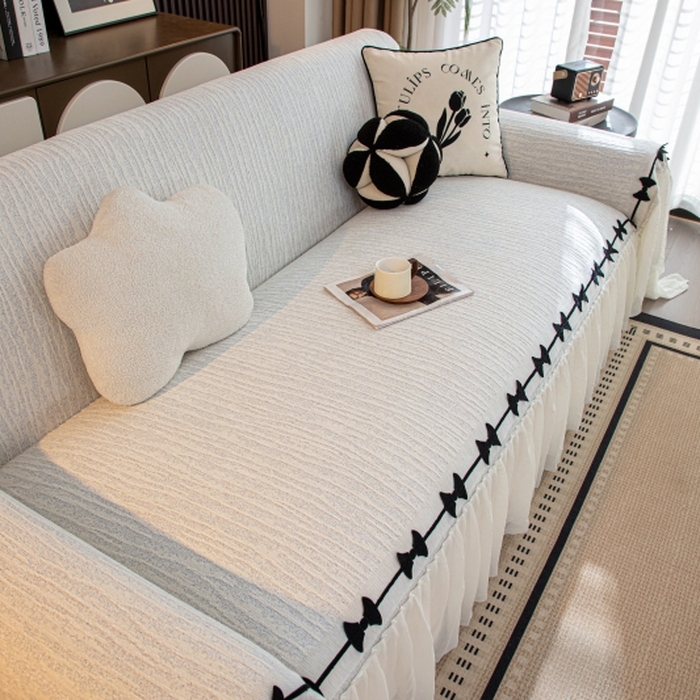 91家纺网 家纺一手货源 找家纺 沐沐家纺 2026新款宛柔蝴蝶结裙边沙发巾 灰色