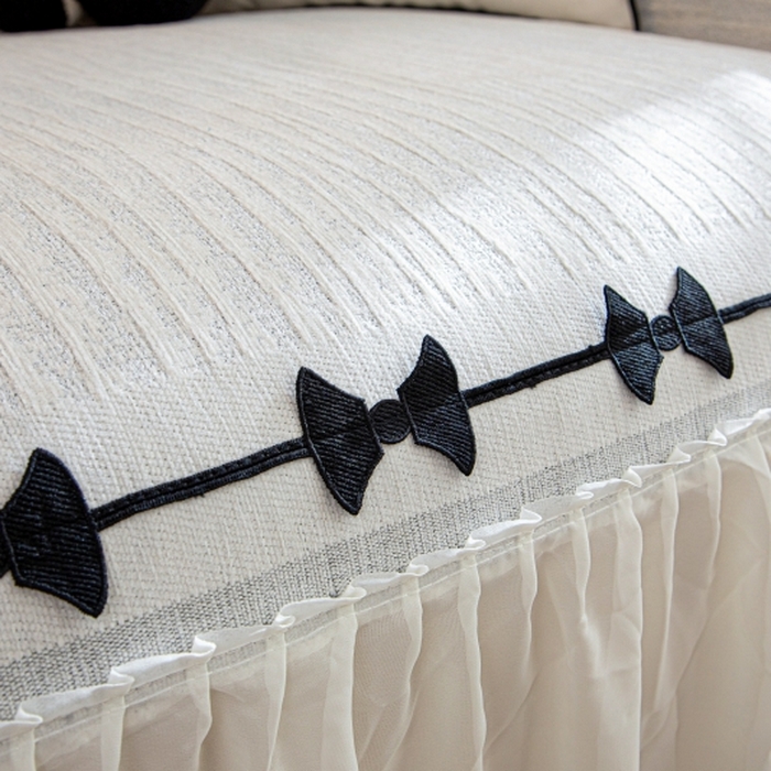 91家纺网 家纺一手货源 找家纺 沐沐家纺 2026新款宛柔蝴蝶结裙边沙发巾 灰色