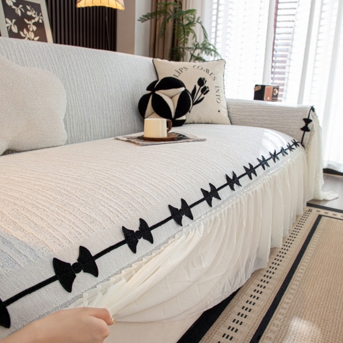 91家纺网 家纺一手货源 找家纺 沐沐家纺 2026新款宛柔蝴蝶结裙边沙发巾 灰色