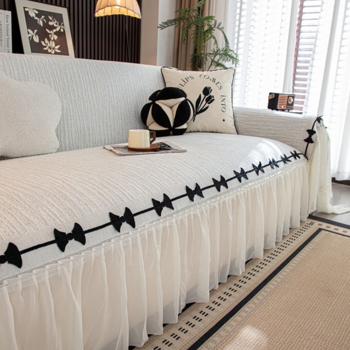 91家纺网 家纺一手货源 找家纺 沐沐家纺 2026新款宛柔蝴蝶结裙边沙发巾 灰色