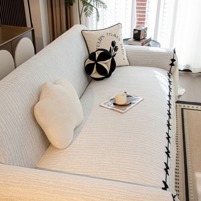 91家纺网 家纺一手货源 找家纺 沐沐家纺 2026新款宛柔蝴蝶结裙边沙发巾 灰色